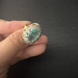 Elegant Gold and Silver Ring with Green Gemstone